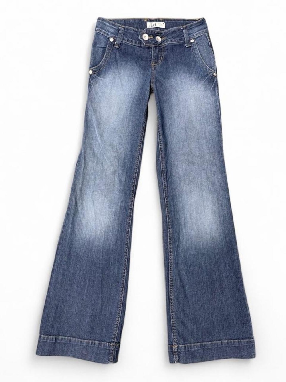 Super low rise blue flare jeans with double button detail. Size: 1